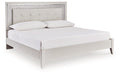 zyniden-upholstered-bed