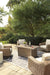 beachcroft-beachcroft-fire-pit-table-with-four-nuvella-swivel-lounge-chairs