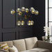 ambition-amber-glass-and-antique-brass-12-light-pendant-chandelier