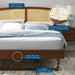 sierra-cane-and-wood-king-platform-bed-with-angular-legs